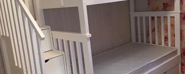Bunk bed with staircase assembled in a Charlotte bedroom