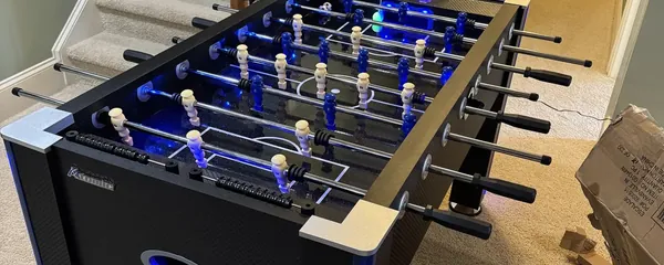 Foosball table assembled in a hallway