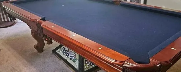 Slate pool table levelled and felted