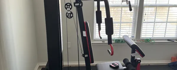 Smith machine and bench assembled by a window