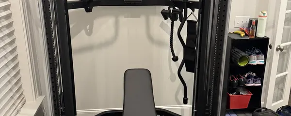 Functional trainer and adjustable bench assembled