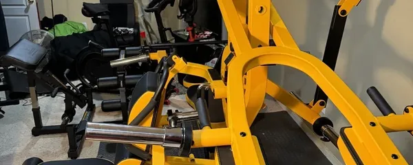Plate-loaded multi-station gym assembled