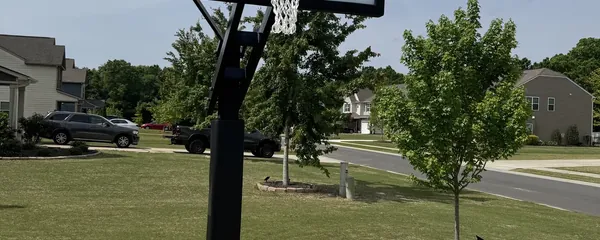 In-ground basketball hoop installed on a driveway
