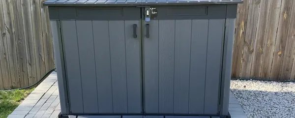 Outdoor storage box assembled on a patio