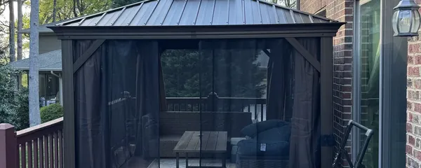 Hardtop gazebo built on a deck