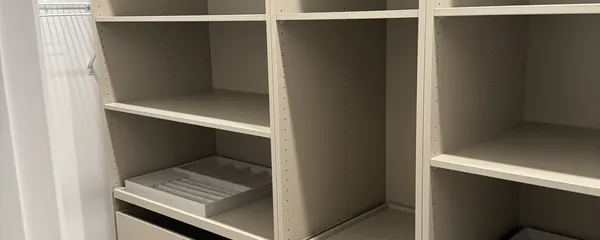 Wardrobe shelving and drawer towers installed