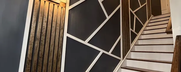 Slat accent wall fitted along a staircase