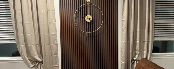 Wood accent wall and curtain track fitted