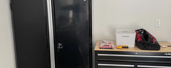 Steel tool cabinets assembled in a garage